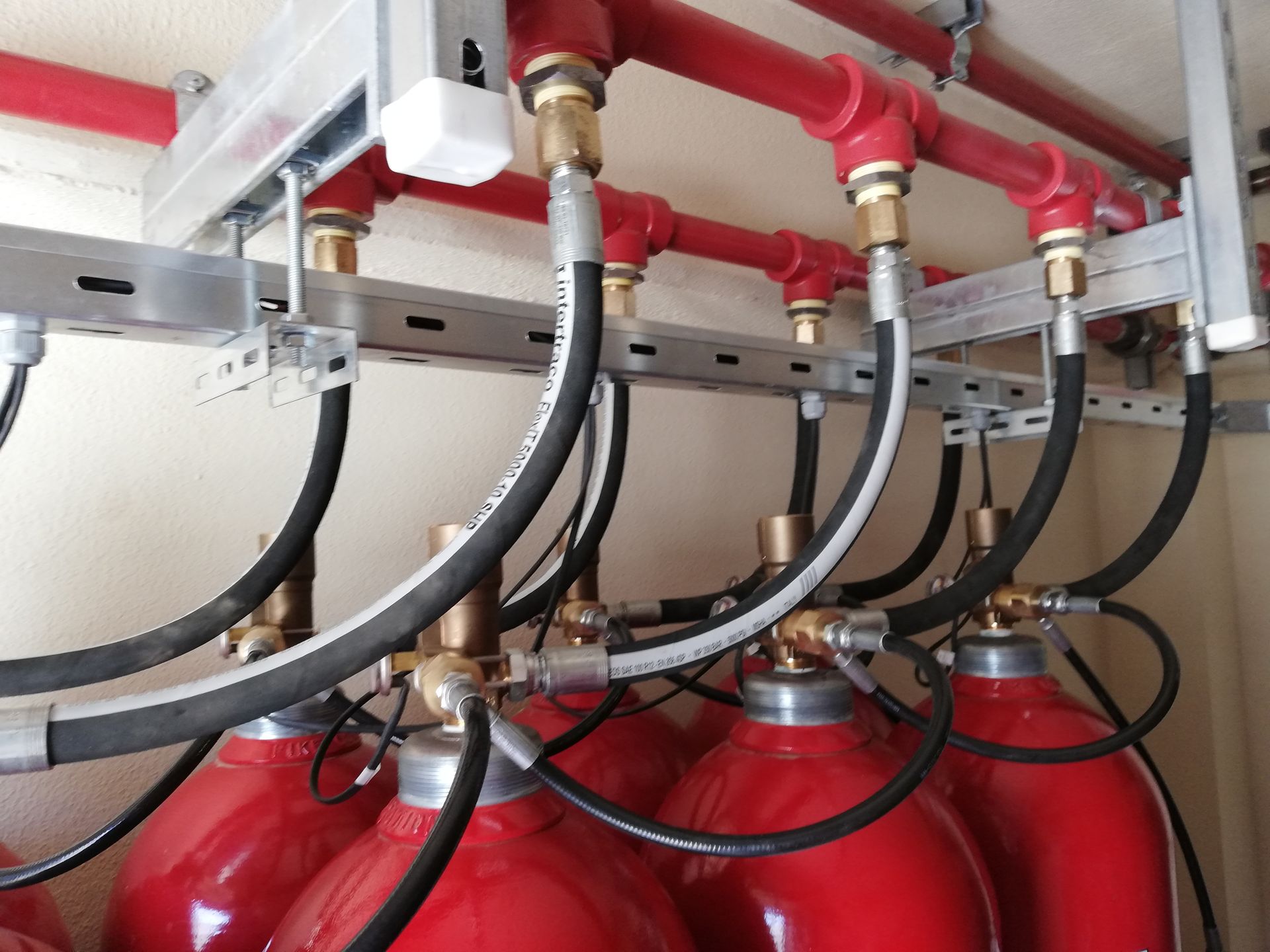 Clean agent fire suppression gas cylinders installed by CIT